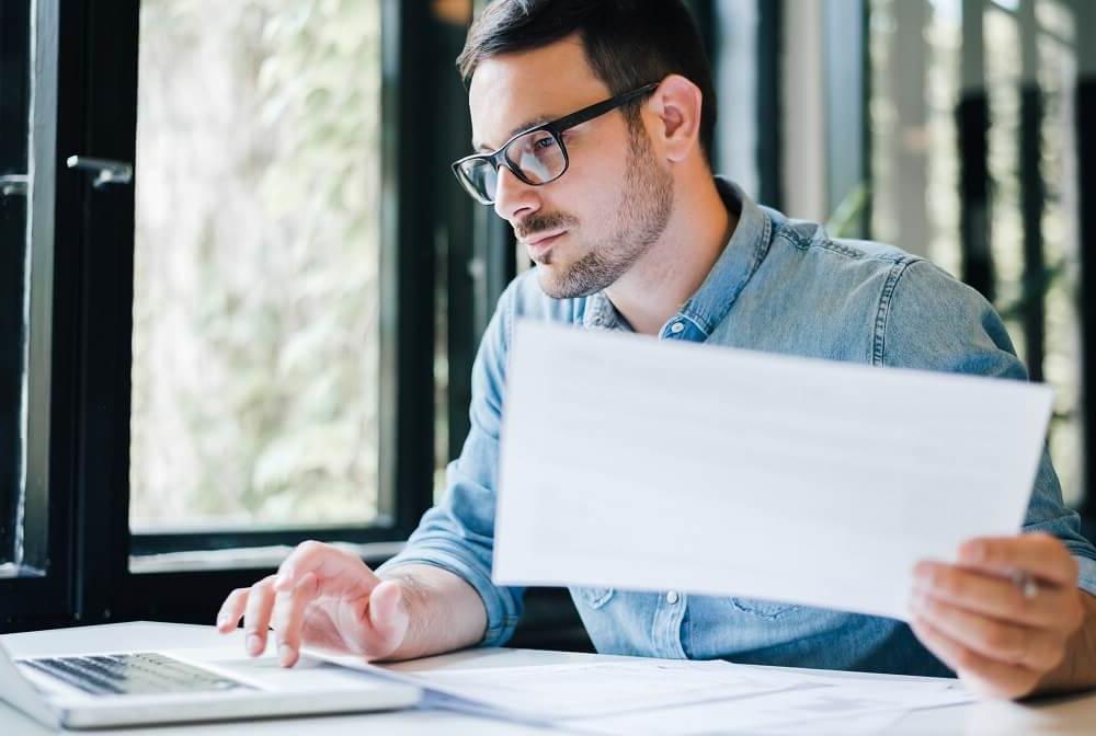 Bookkeeper Working at Laptop